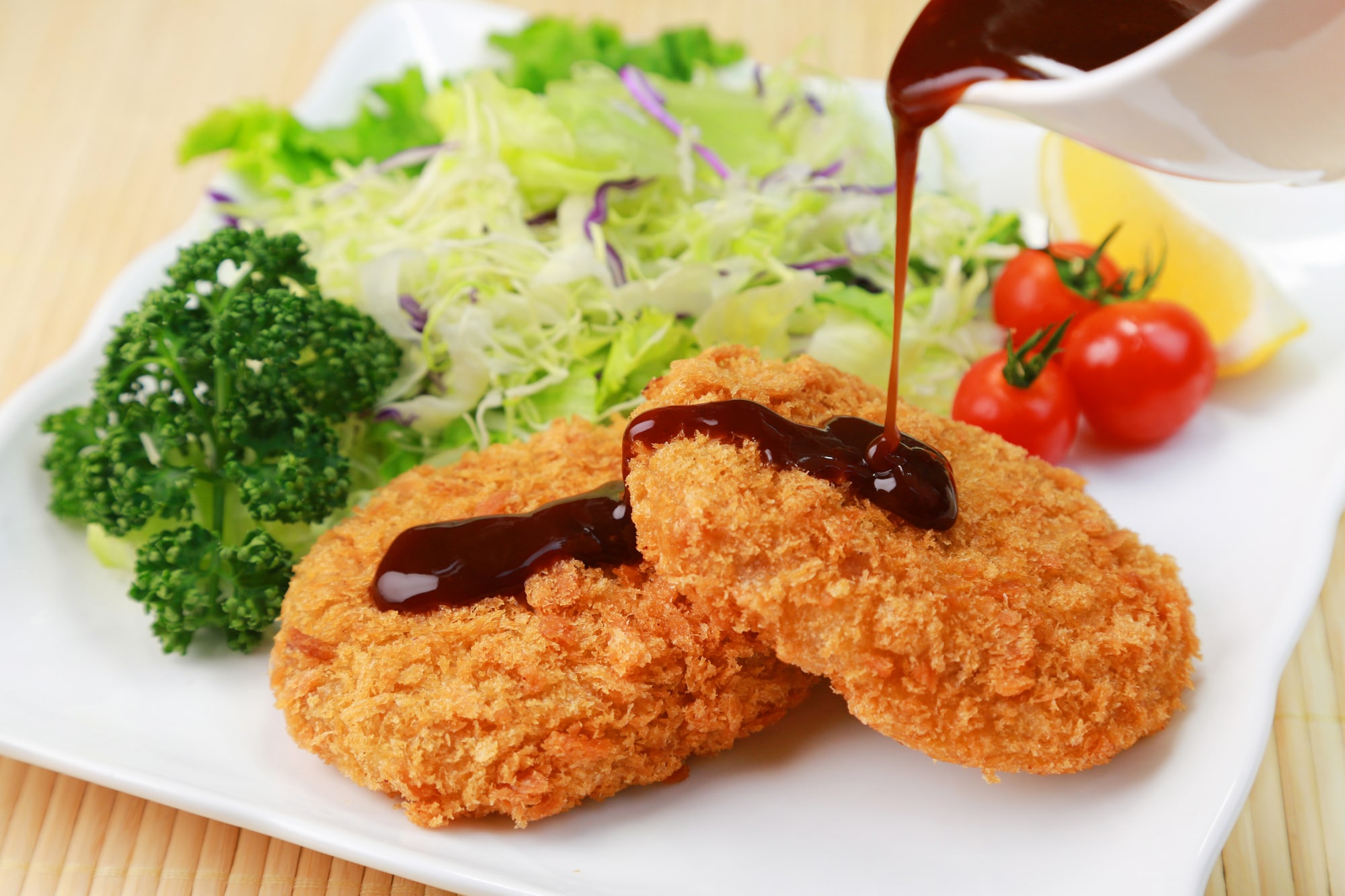 Sauce poured over croquettes