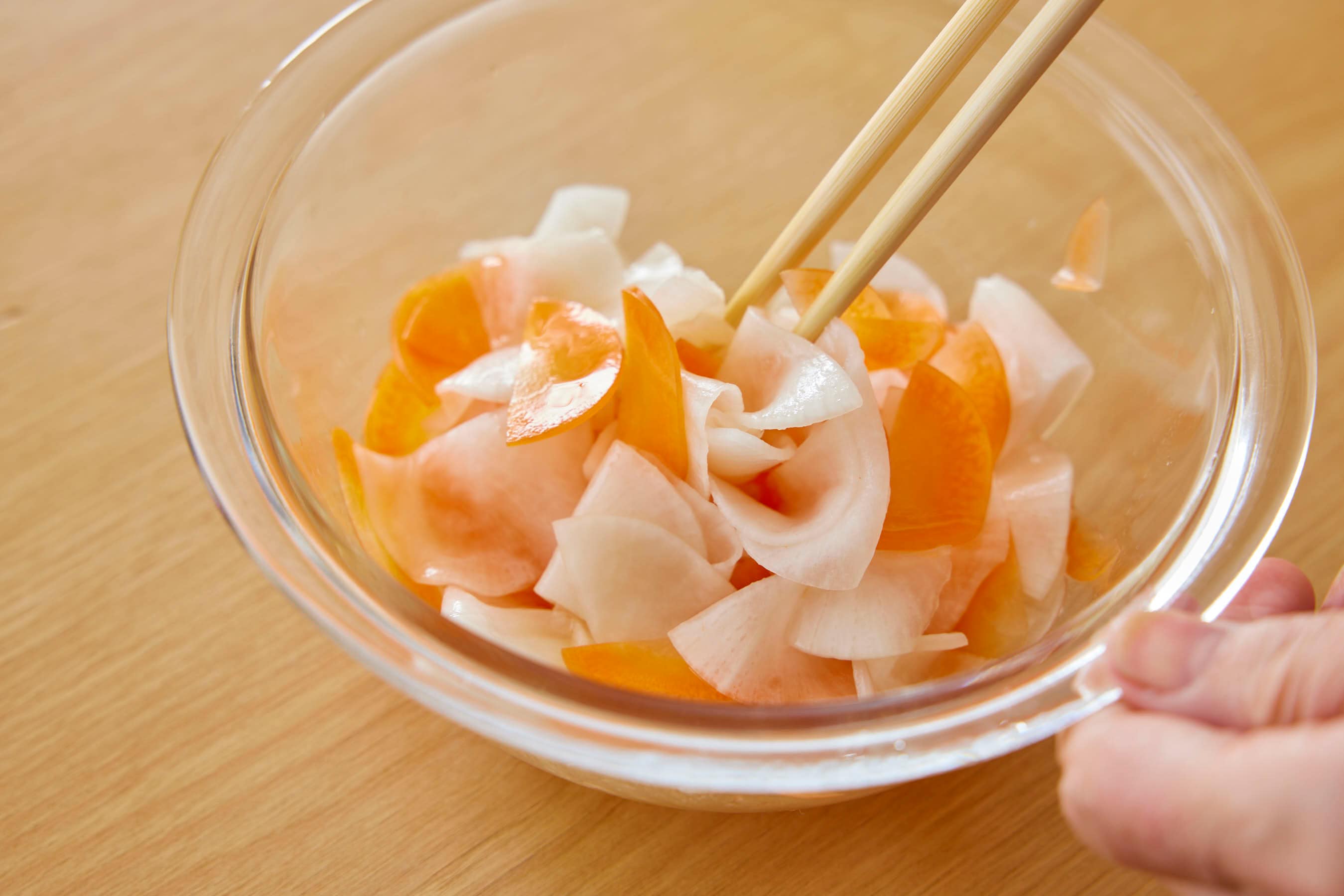 Mixing vegetables with sweet vinegar