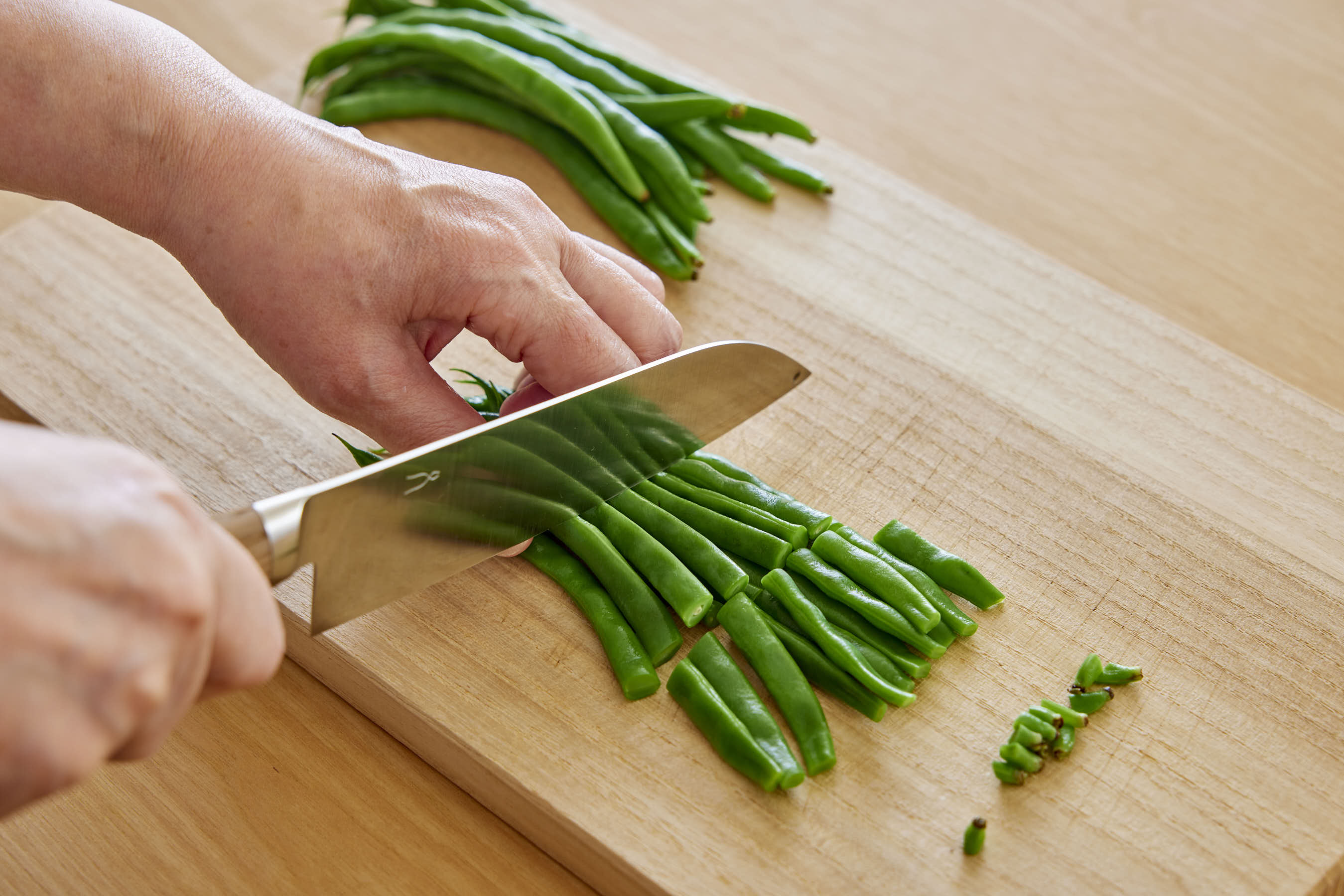 Trim the stem ends off the green beans