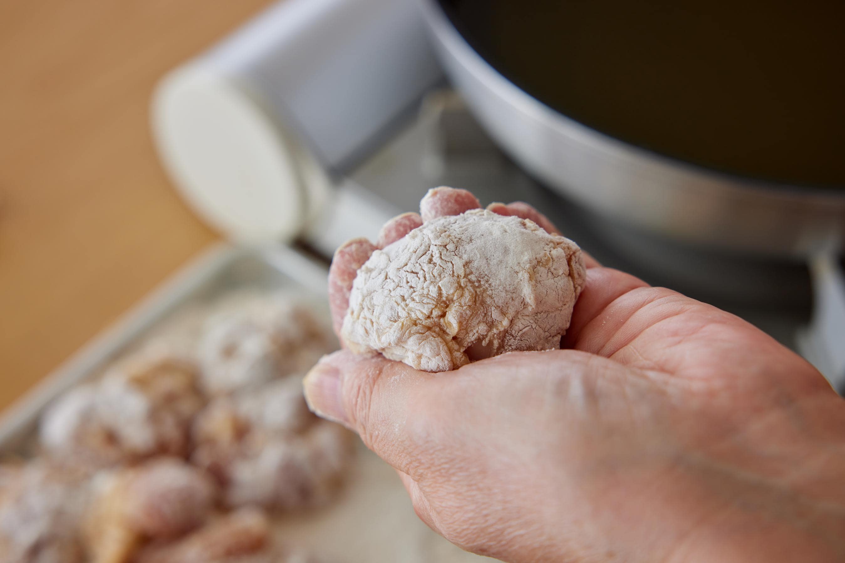 rolling chicken into a ball