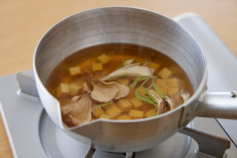 Simmering ingredients in a pot