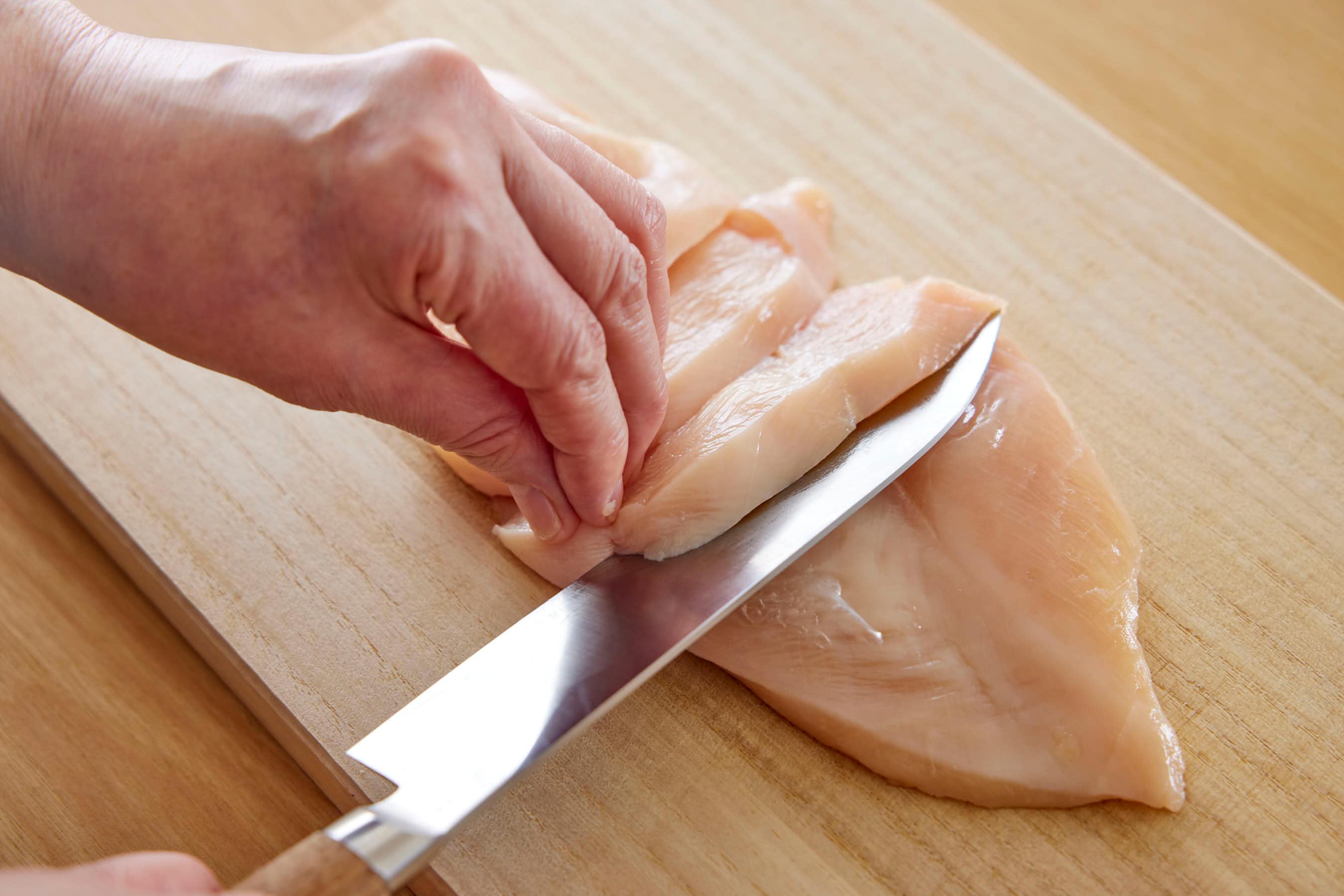 Slicing the chicken diagonally