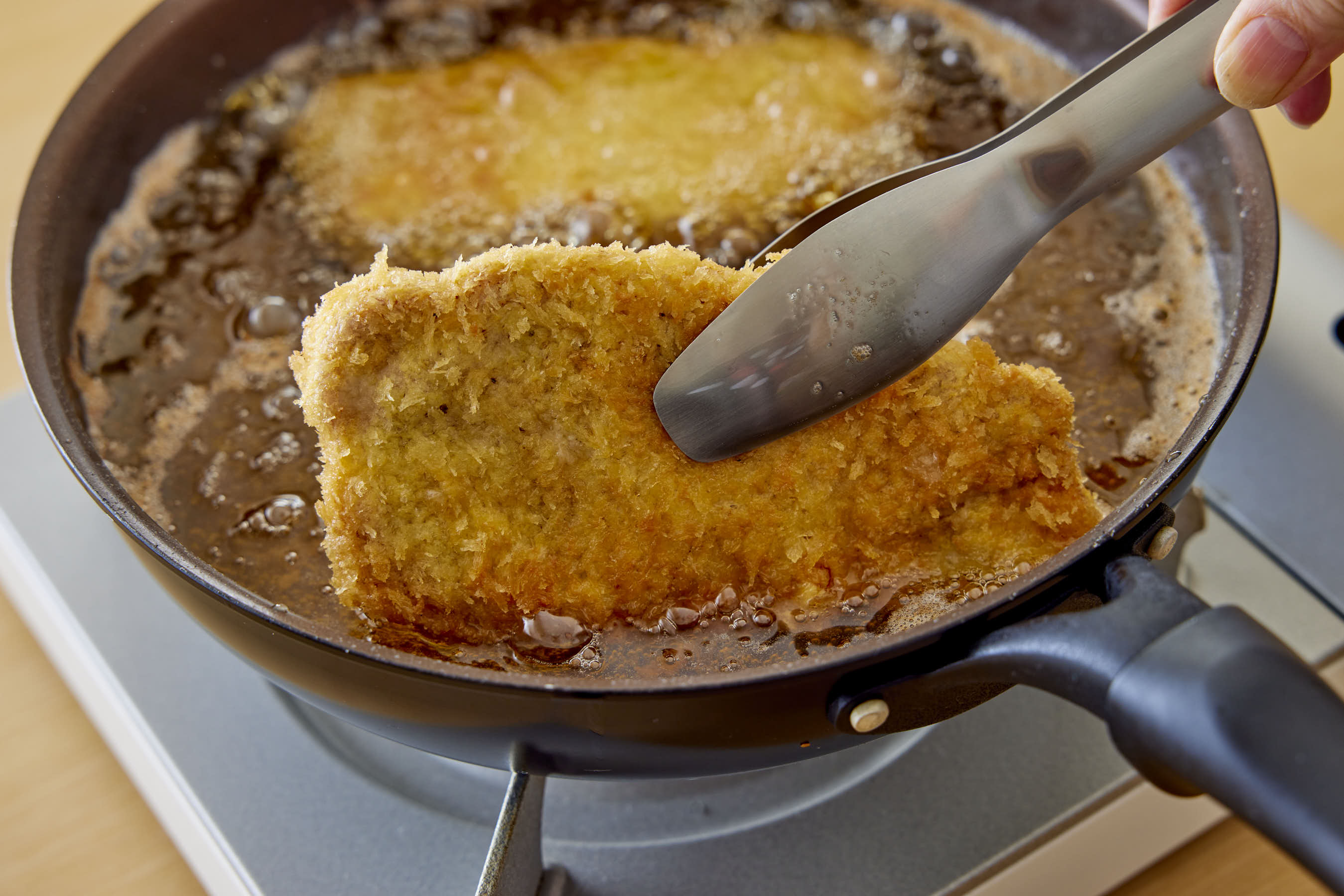 Deep-frying the pork