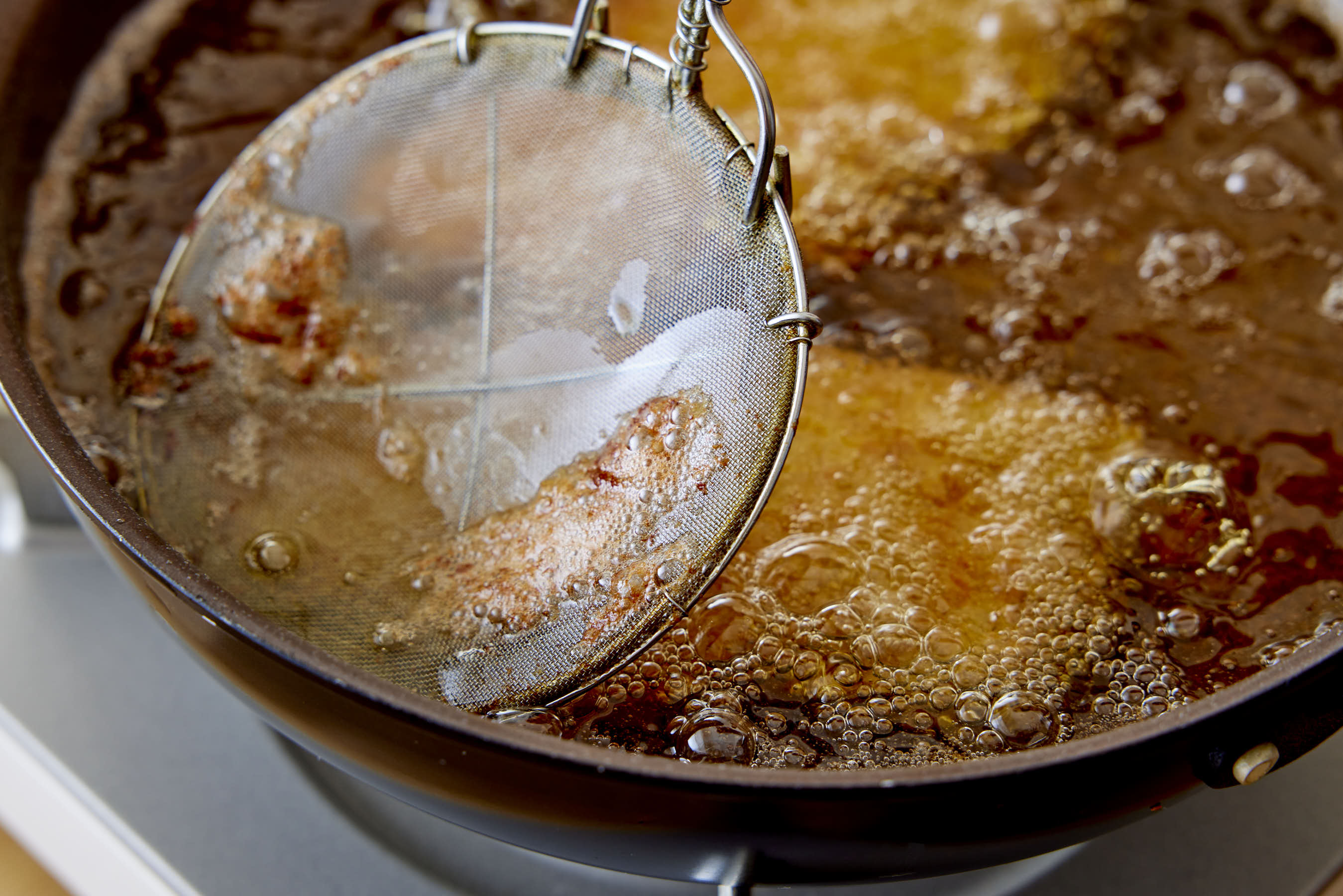 Deep-frying the pork