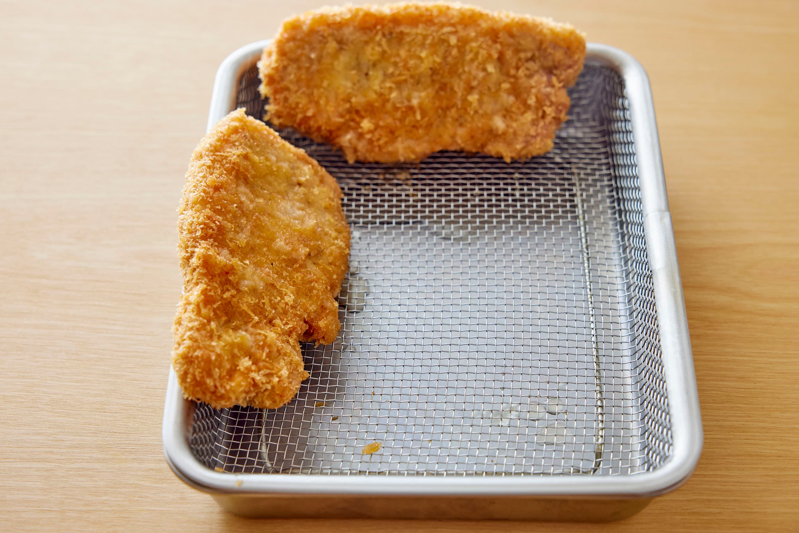 Placing the Tonkatsu on a wire rack