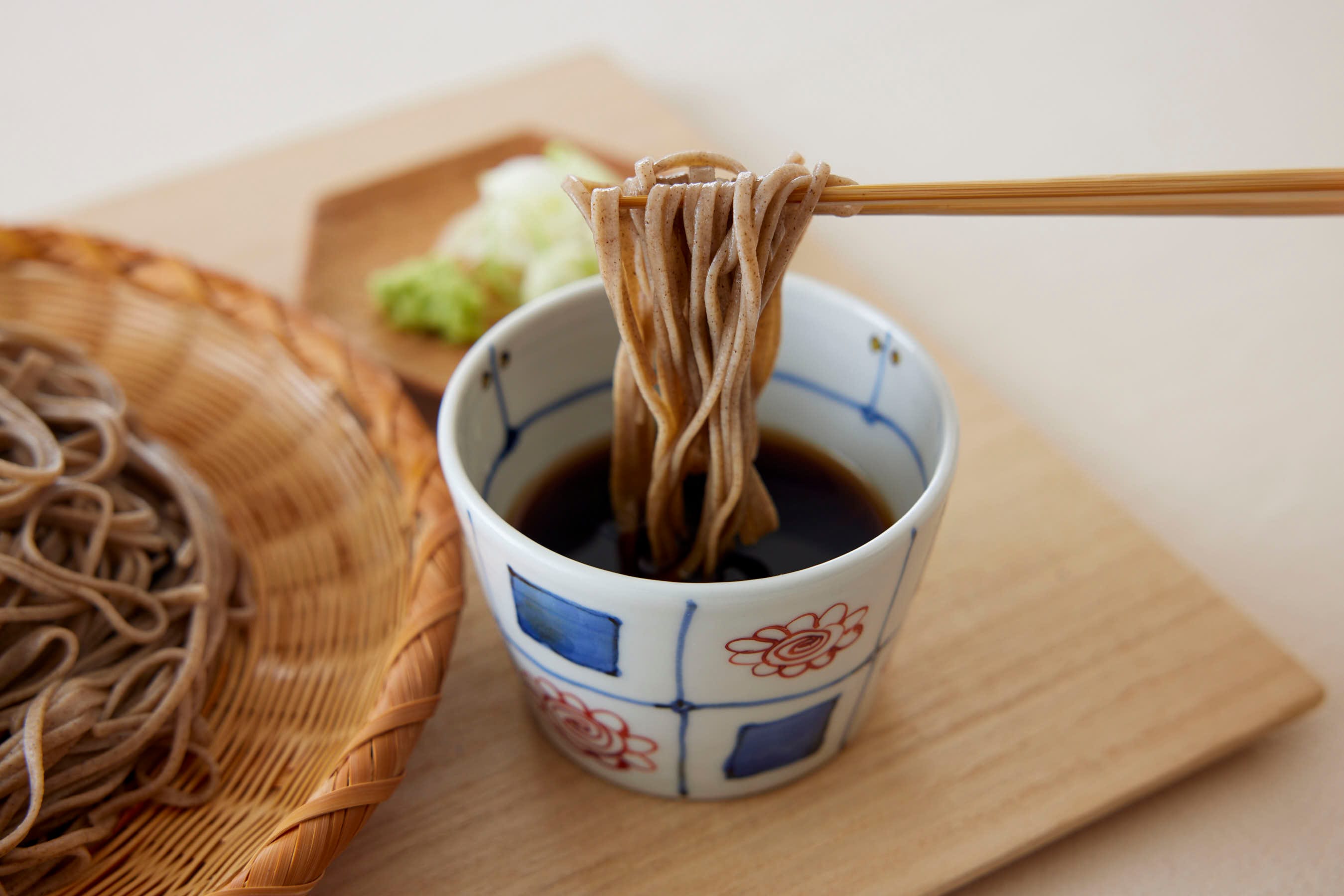 Dipping soba noodles in tsuyu